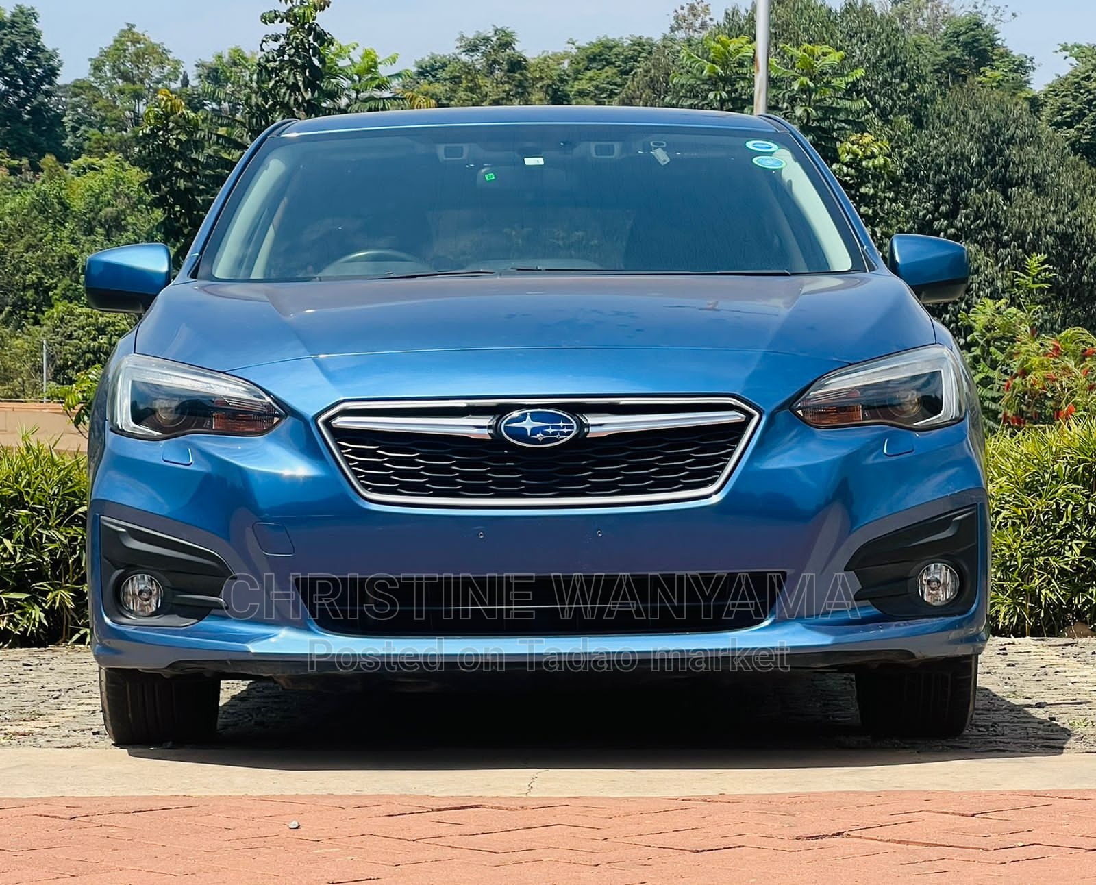 Blue Subaru Impreza 2