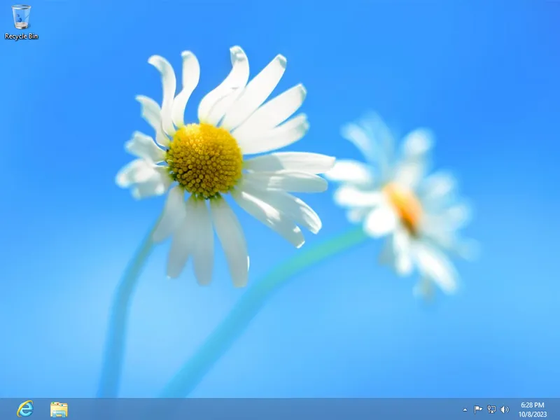 The Windows 8 desktop, which notably is missing the iconic “Start” button in the bottom taskbar.