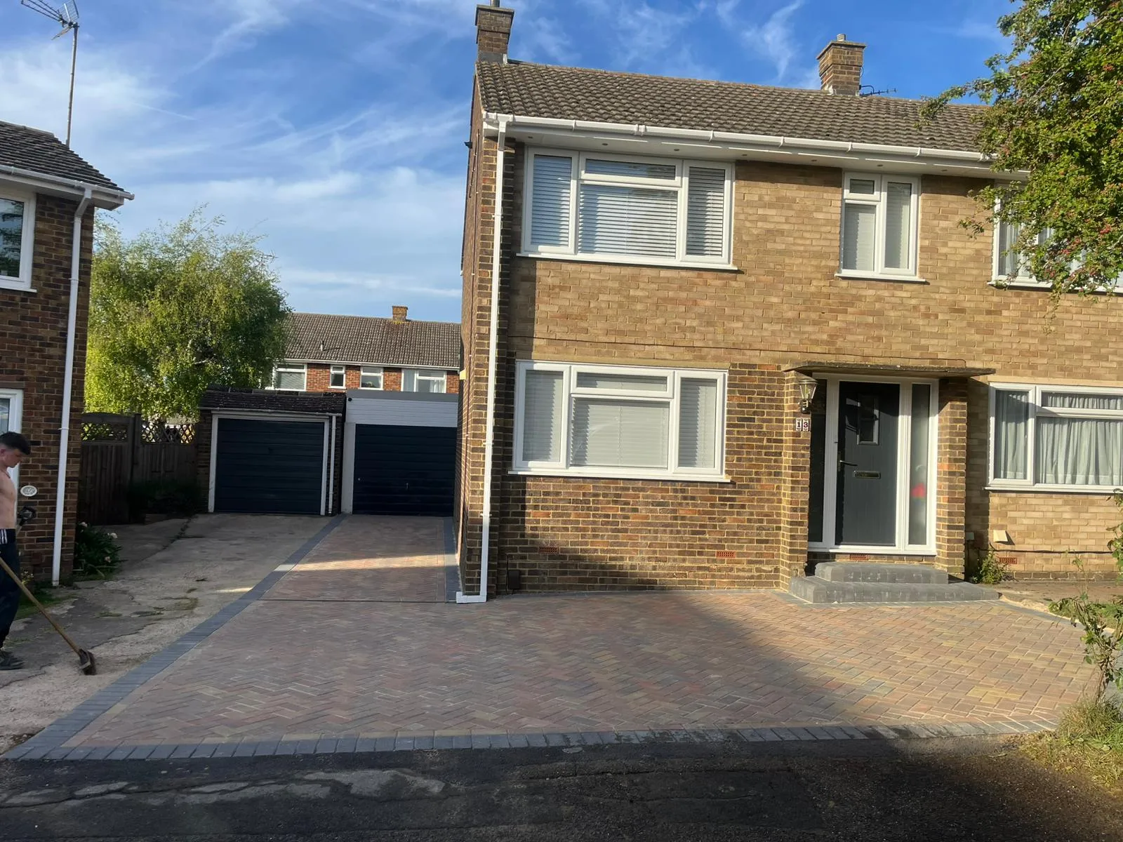 Expertly finished block paving driveway with herringbone design by Top Pave Driveways LTD
