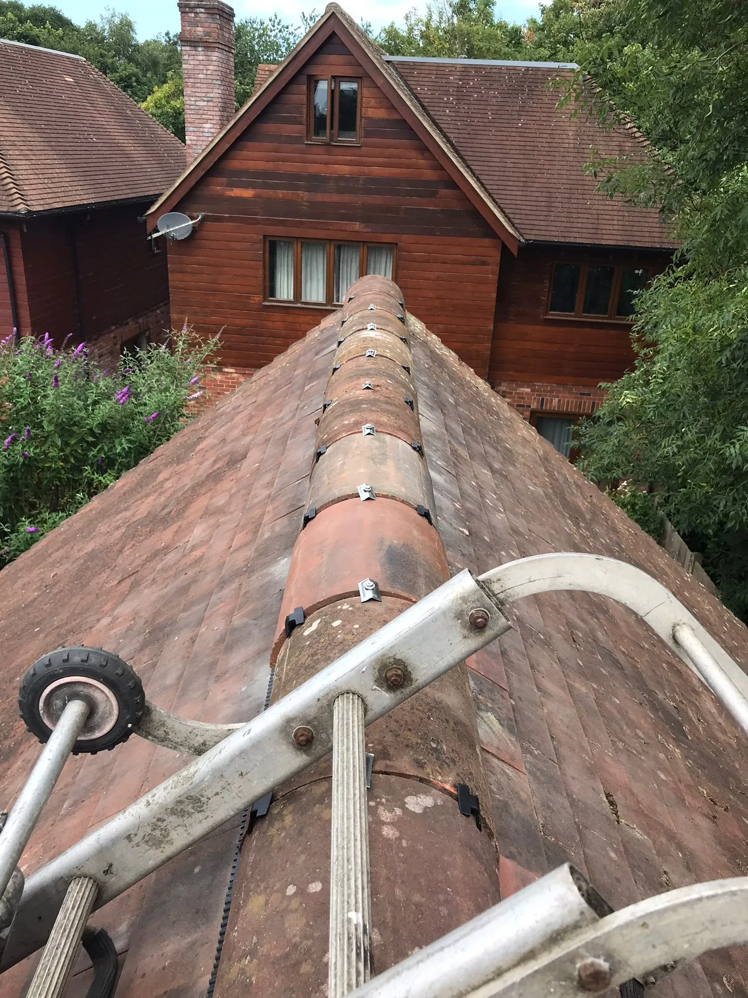 Roof ladder on a residential tiled pitched roof