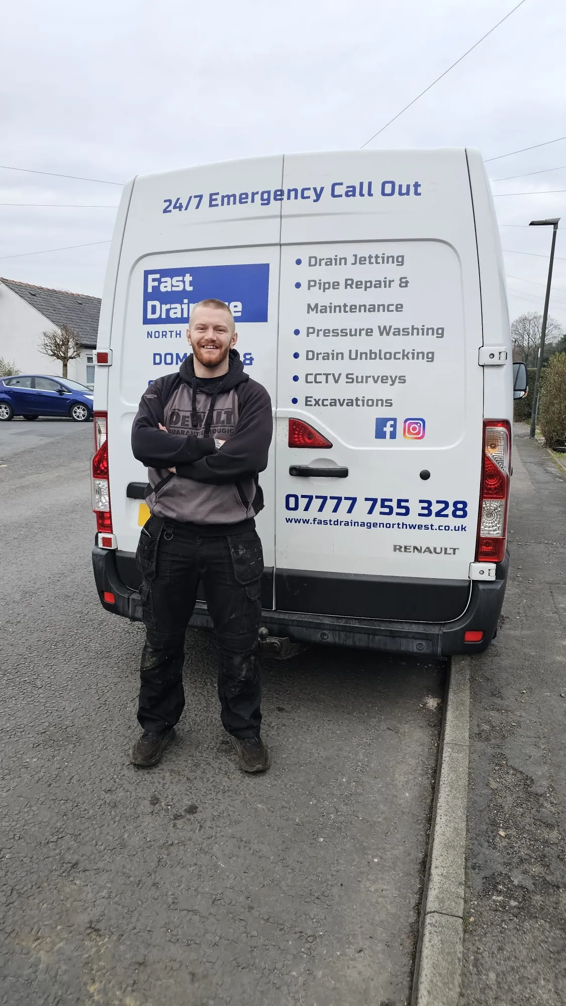 Fast Drainage Northwest engineer and branded company van advertising 24/7 emergency drainage services.
