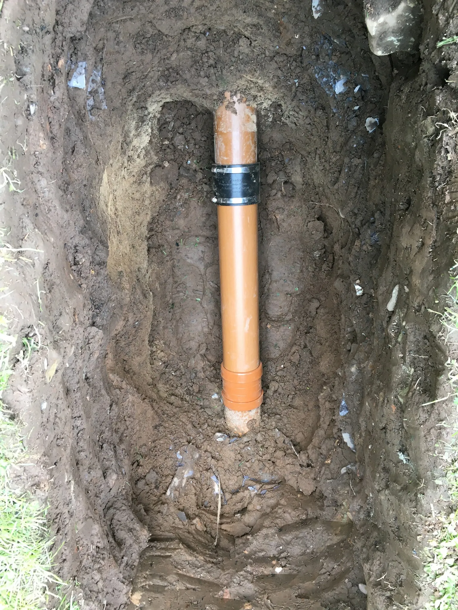 Exposing underground clay pipes during deep excavation