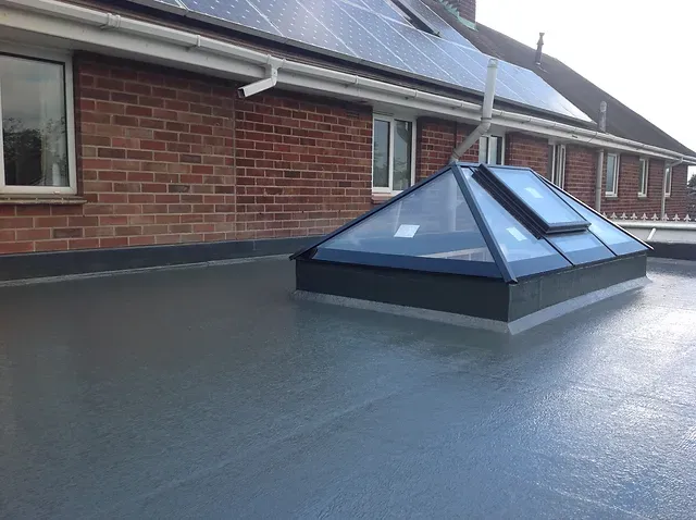 Modern flat roof with large pyramid roof lantern / skylight installed