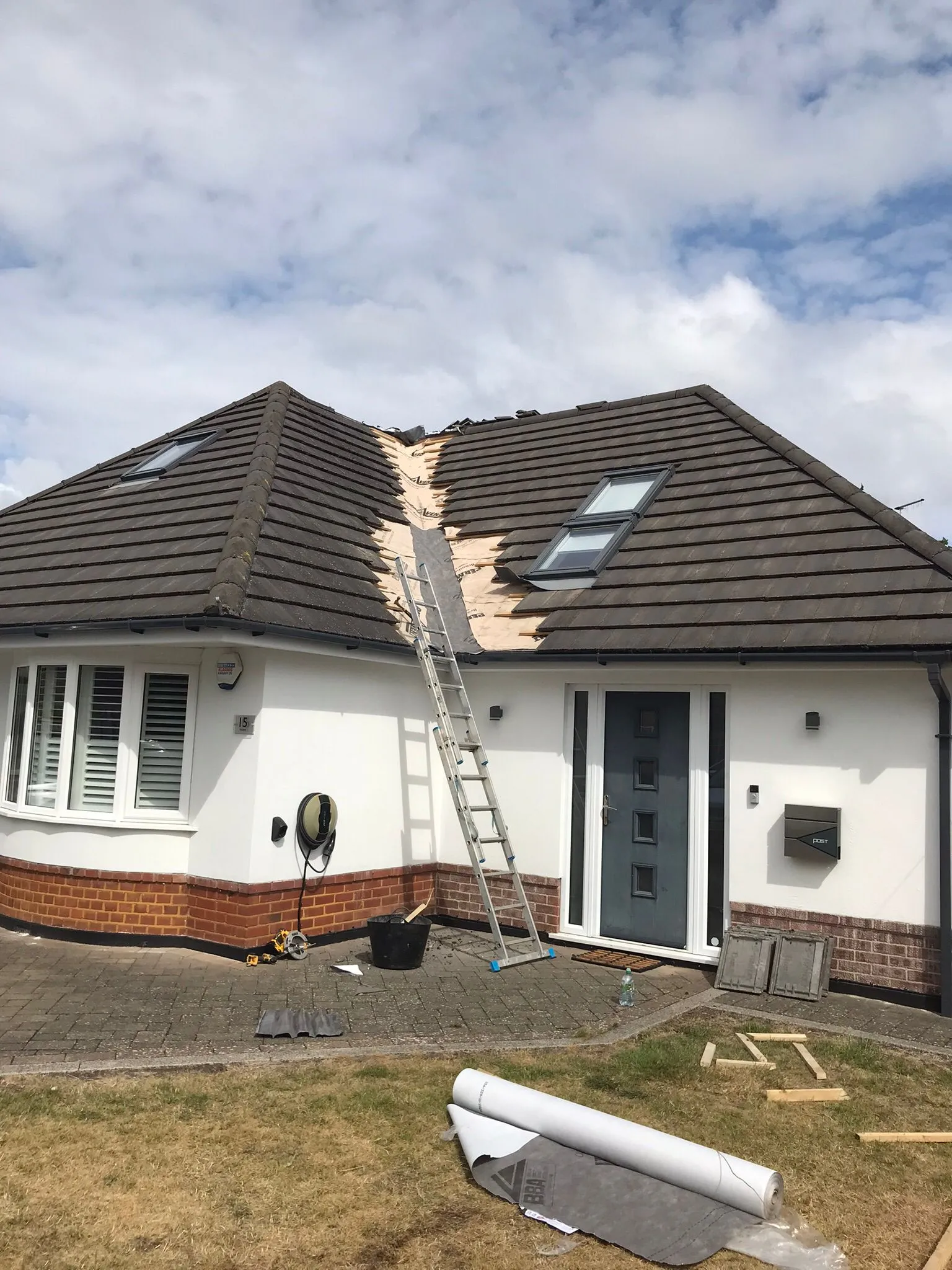 Pitched roof repair on a residential property.