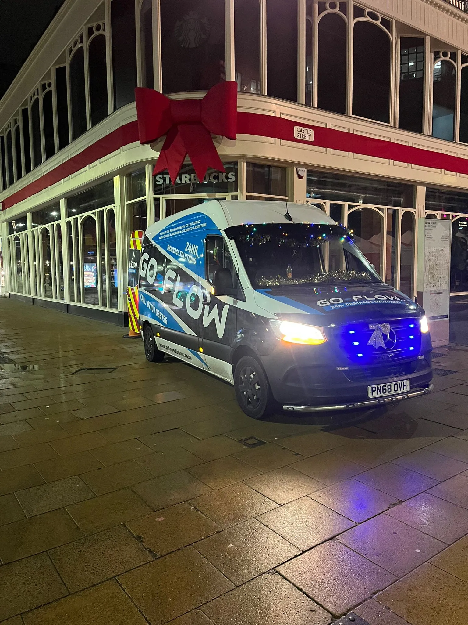 GO-FLOW Drainage Solutions LTD van parked at night, ready for 24/7 emergency drainage, plumbing, and heating services.