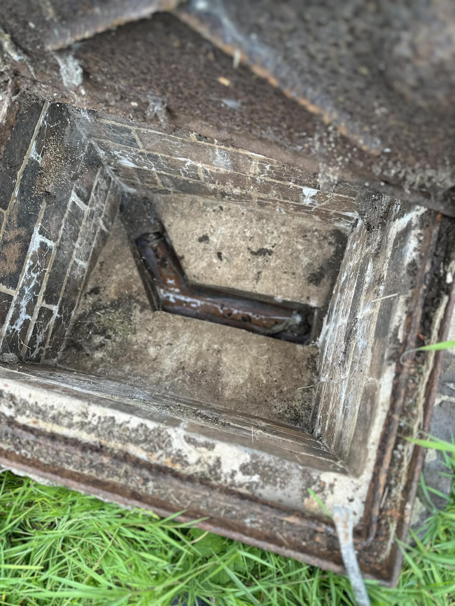 View inside an open drain manhole or inspection chamber