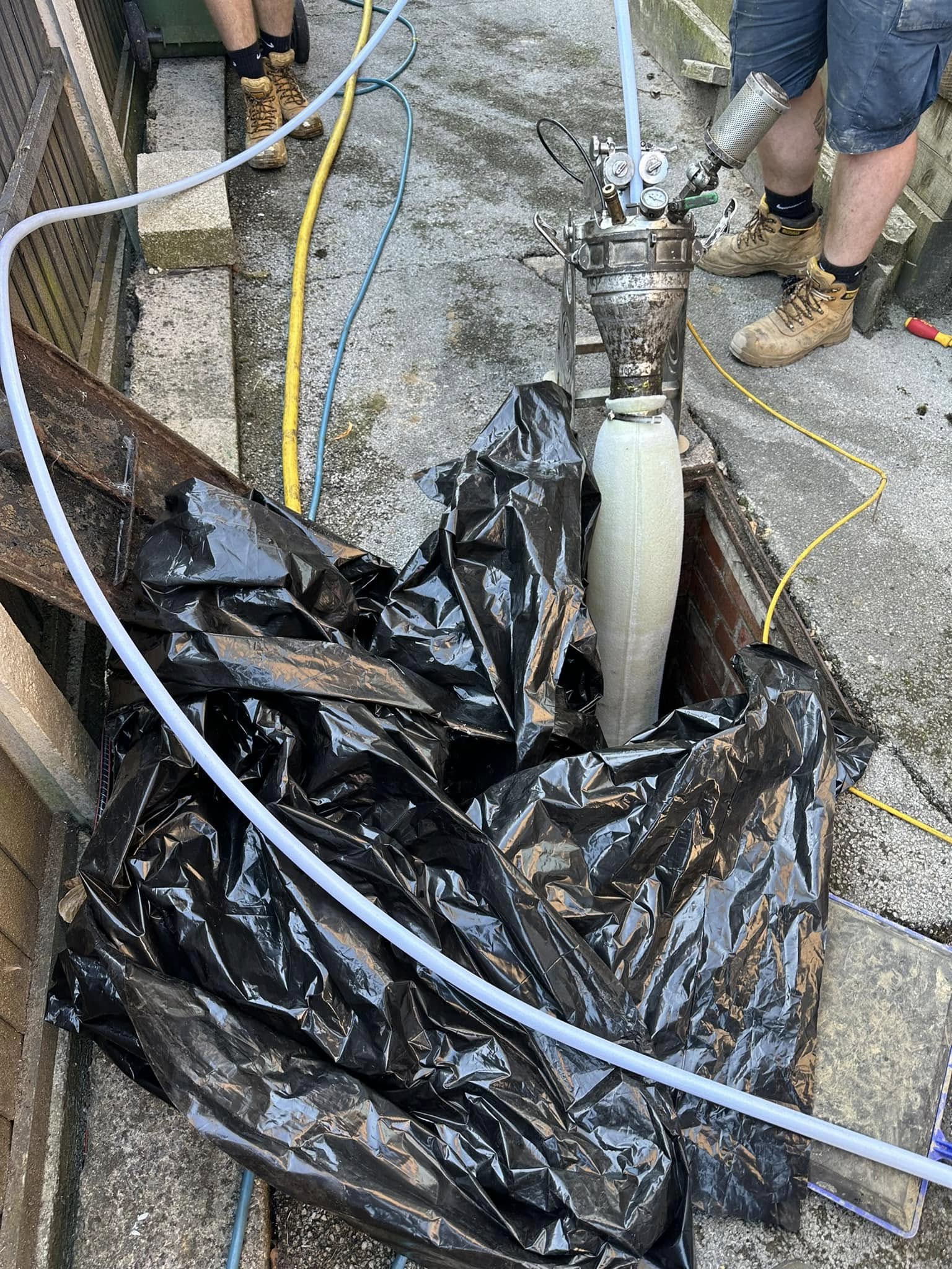 No-dig drain relining in progress by a local Drain 2 Flow Torquay engineer, showing advanced CIPP pipe repair technology.