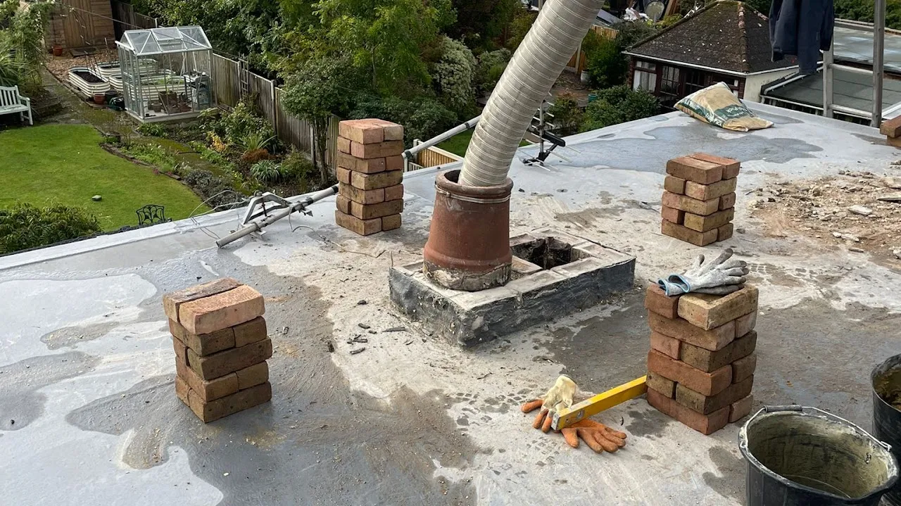 Ongoing chimney repair and flat roofing work by Century Roofing and Building in Kent.