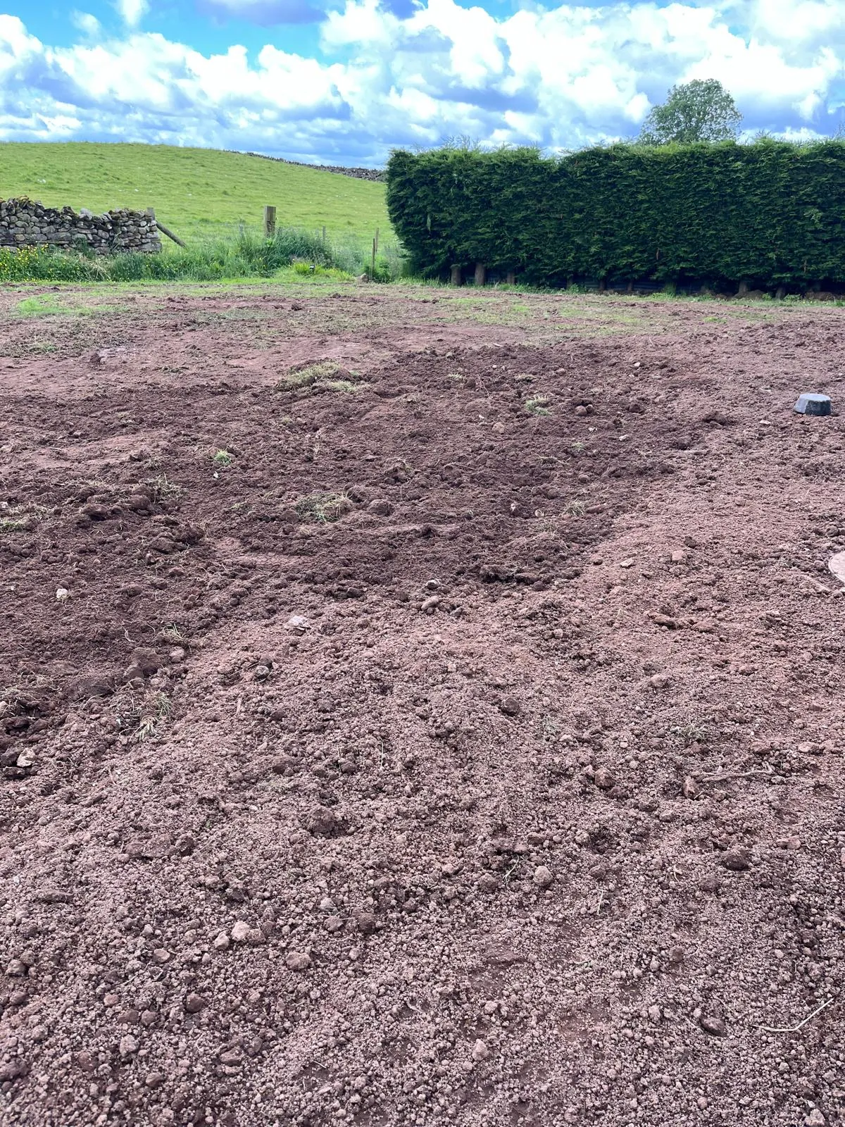Prepared ground for landscaping or construction work