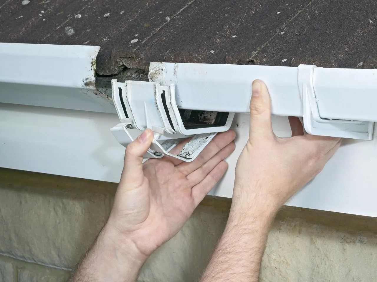 Professional installation of white uPVC guttering in Haywards Heath