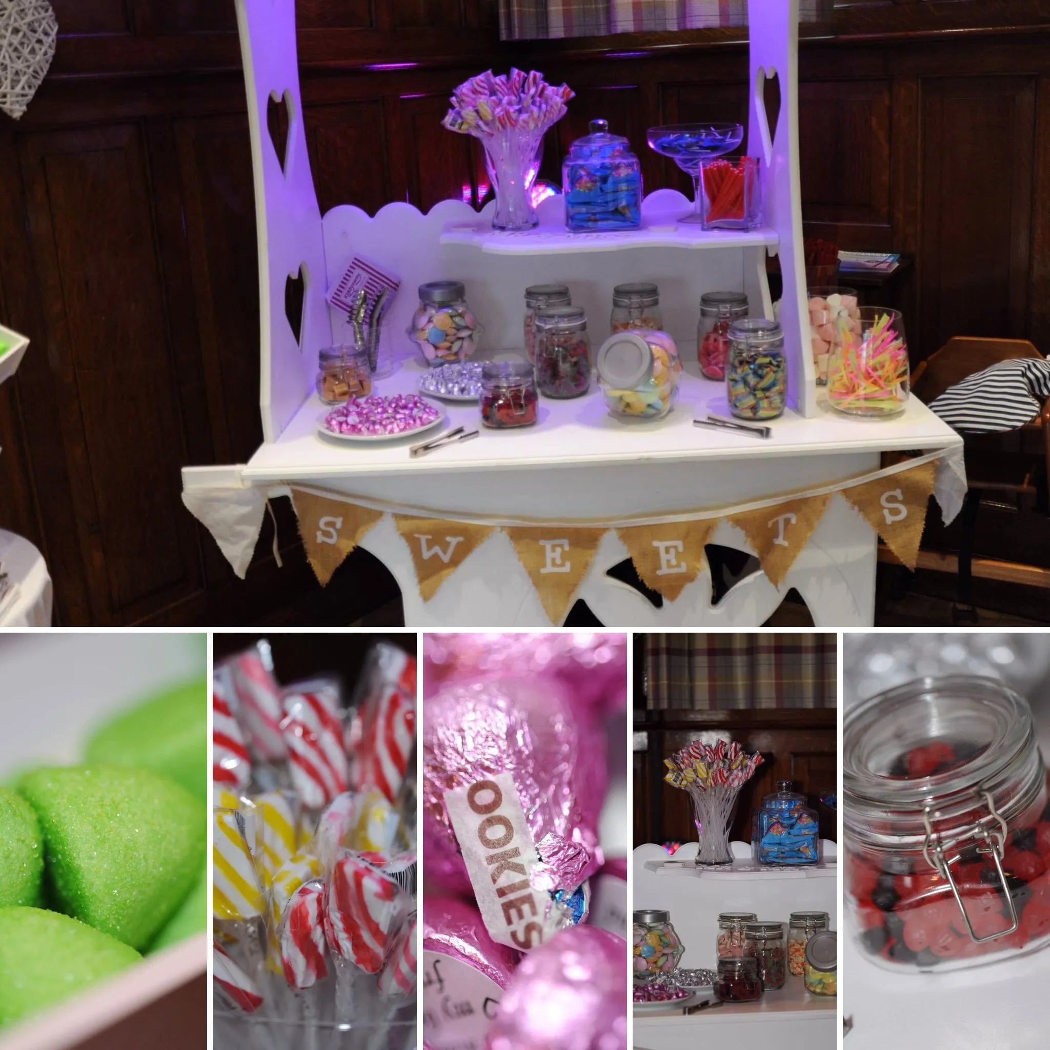 A white candy cart filled with various sweets in glass jars and on plates, featuring a 'SWEETS' banner.