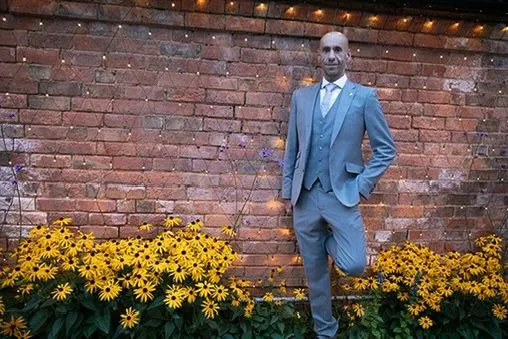 Professional DJ in smart suit, ready to host your next event