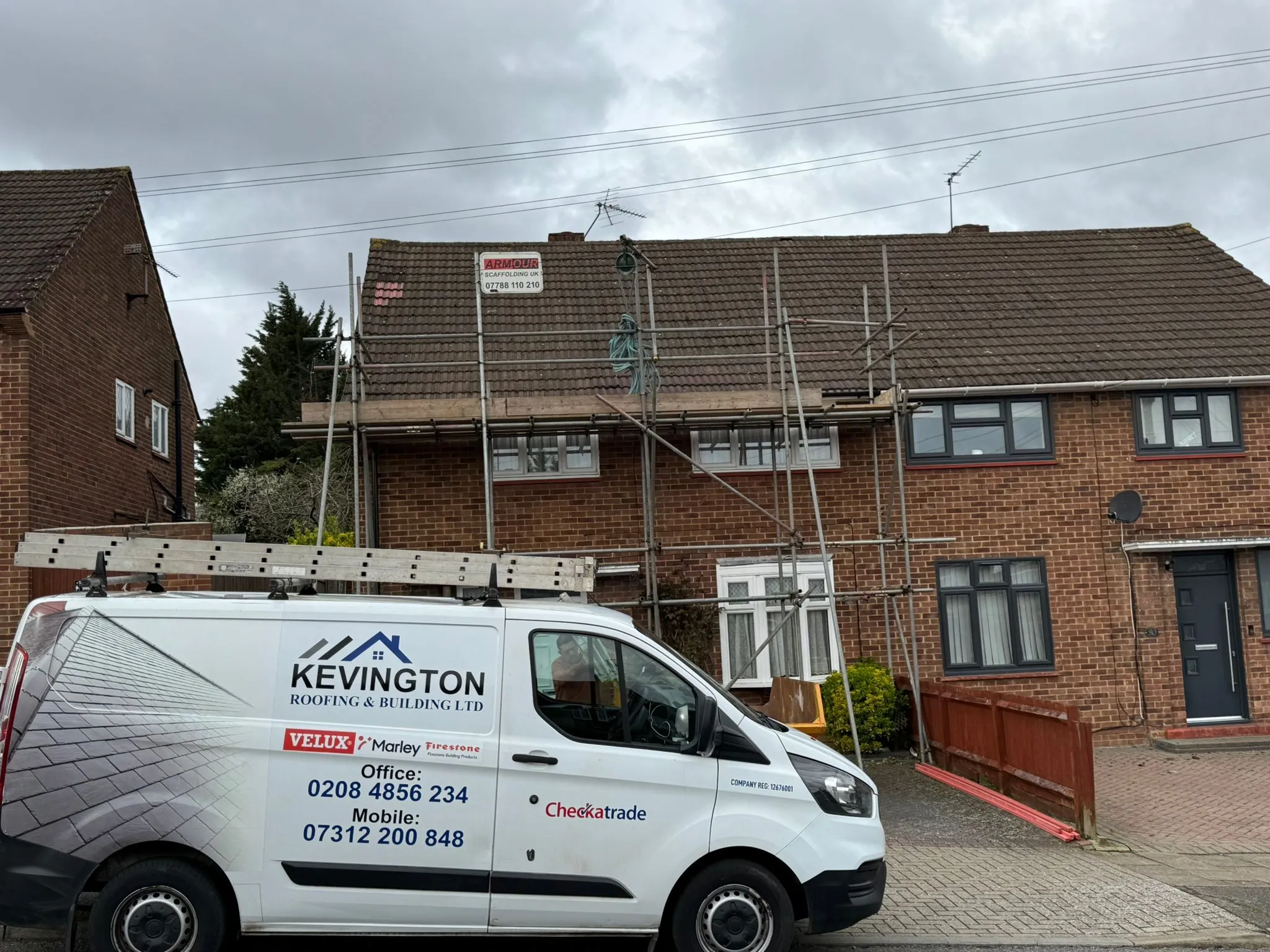 Kevington Roofing and Building LTD van parked on site with scaffolding