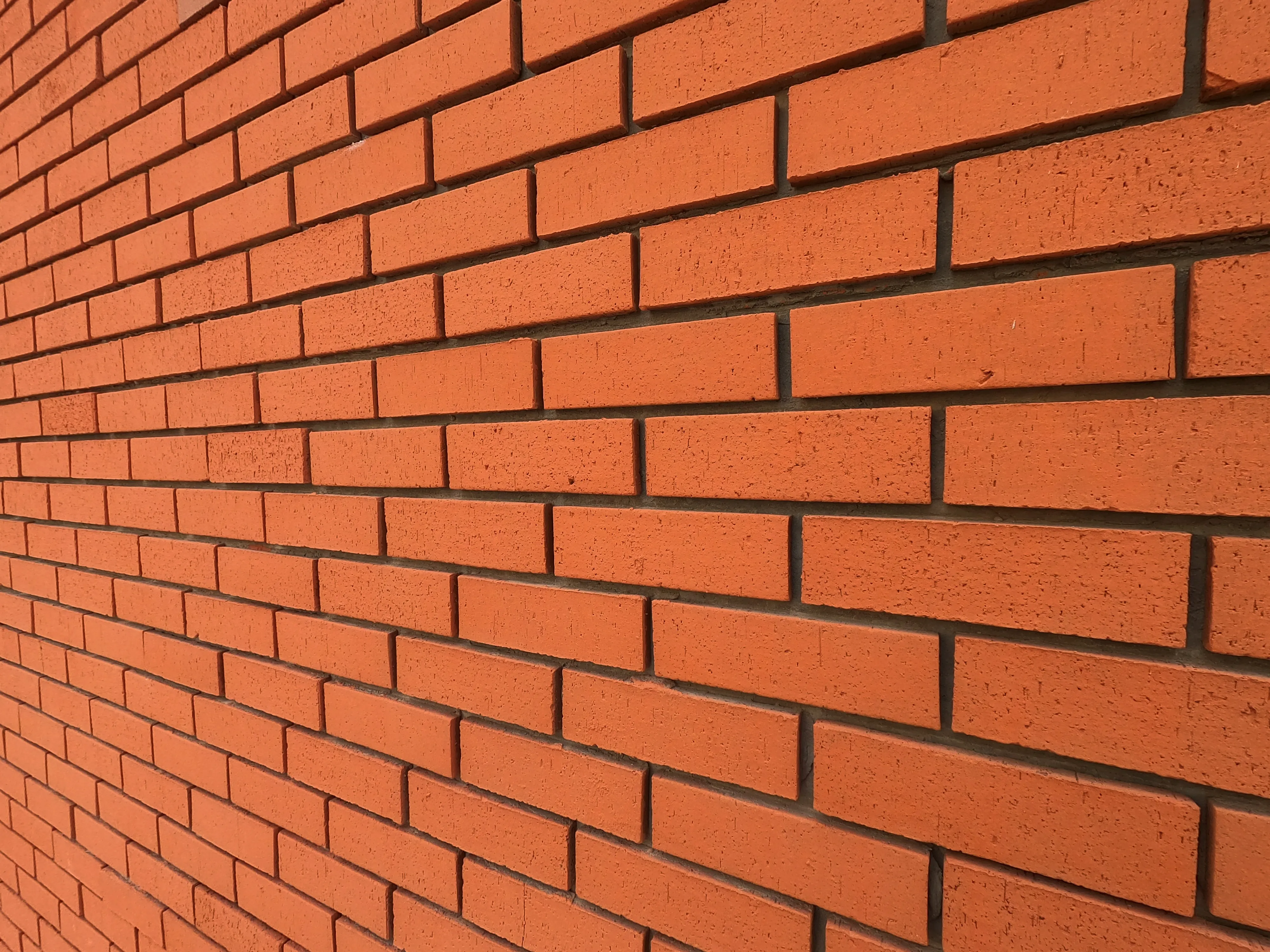 Close up of a red brick wall