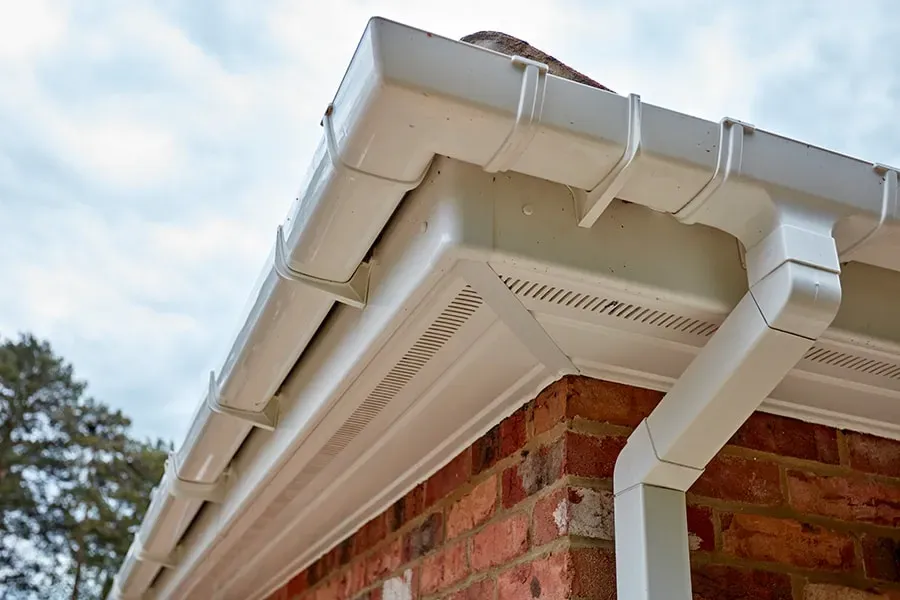 Professional installation of white uPVC fascias, soffits, and guttering.
