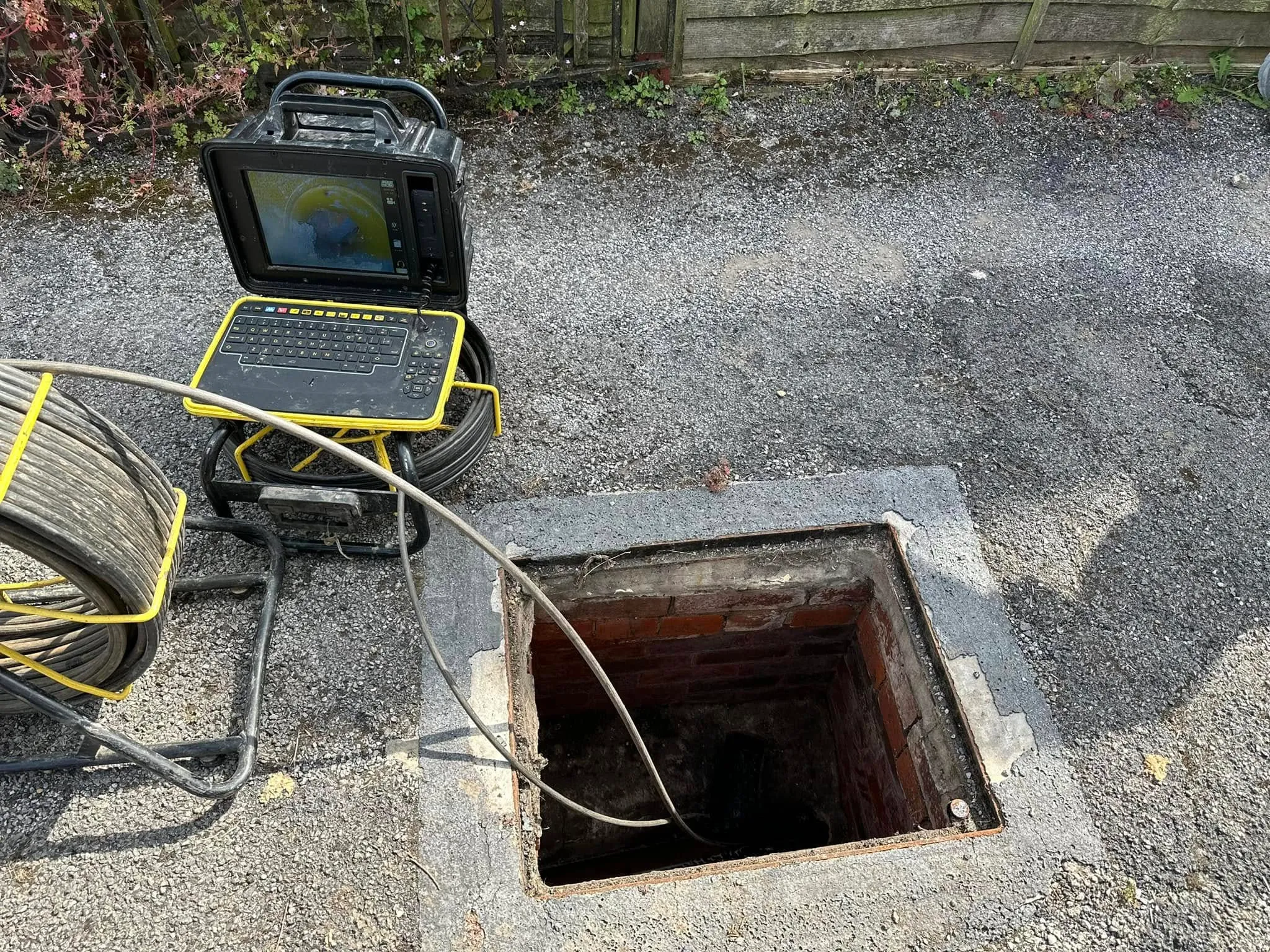 Professional CCTV drain survey in progress on a property's drainage system in Devon.