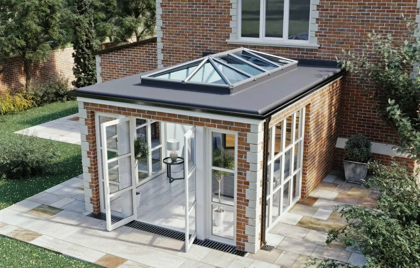 Contemporary orangery extension with glass roof lantern and bi-fold doors