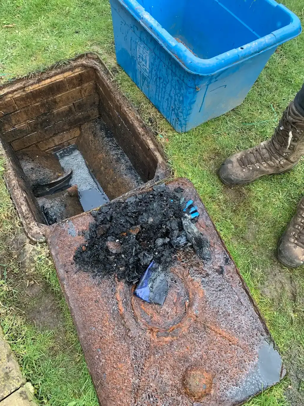 Professional sewer unblocking in Durham showing debris removed from an external drainage manhole.