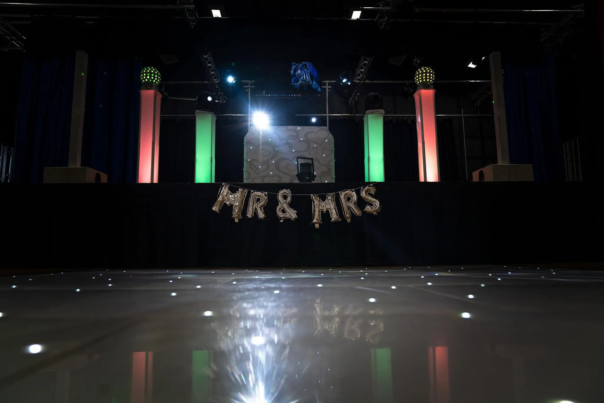 Professional DJ setup with sparkling white LED starlit dancefloor and MR and MRS balloons