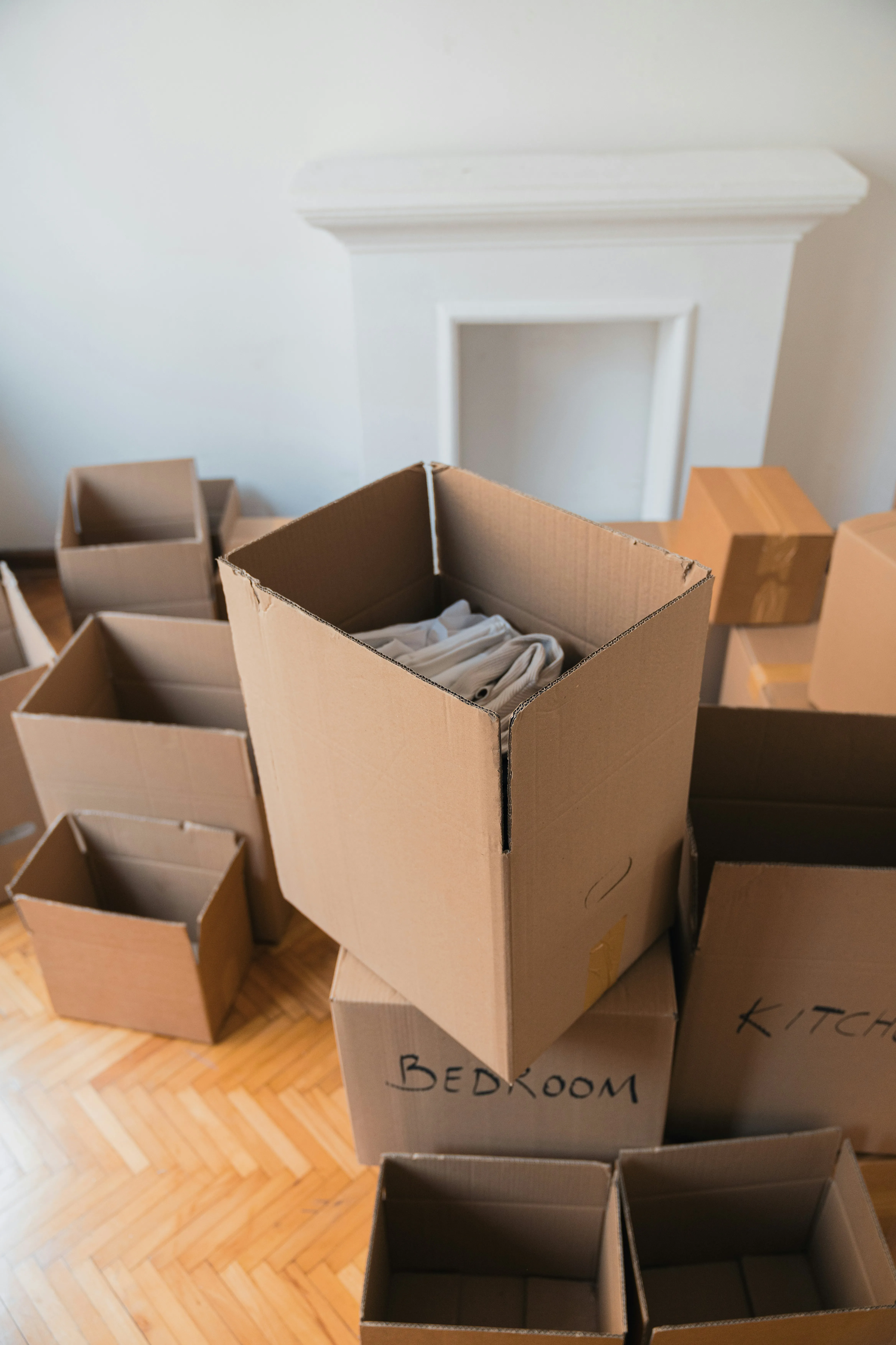 Packed moving boxes ready for home removal services from London