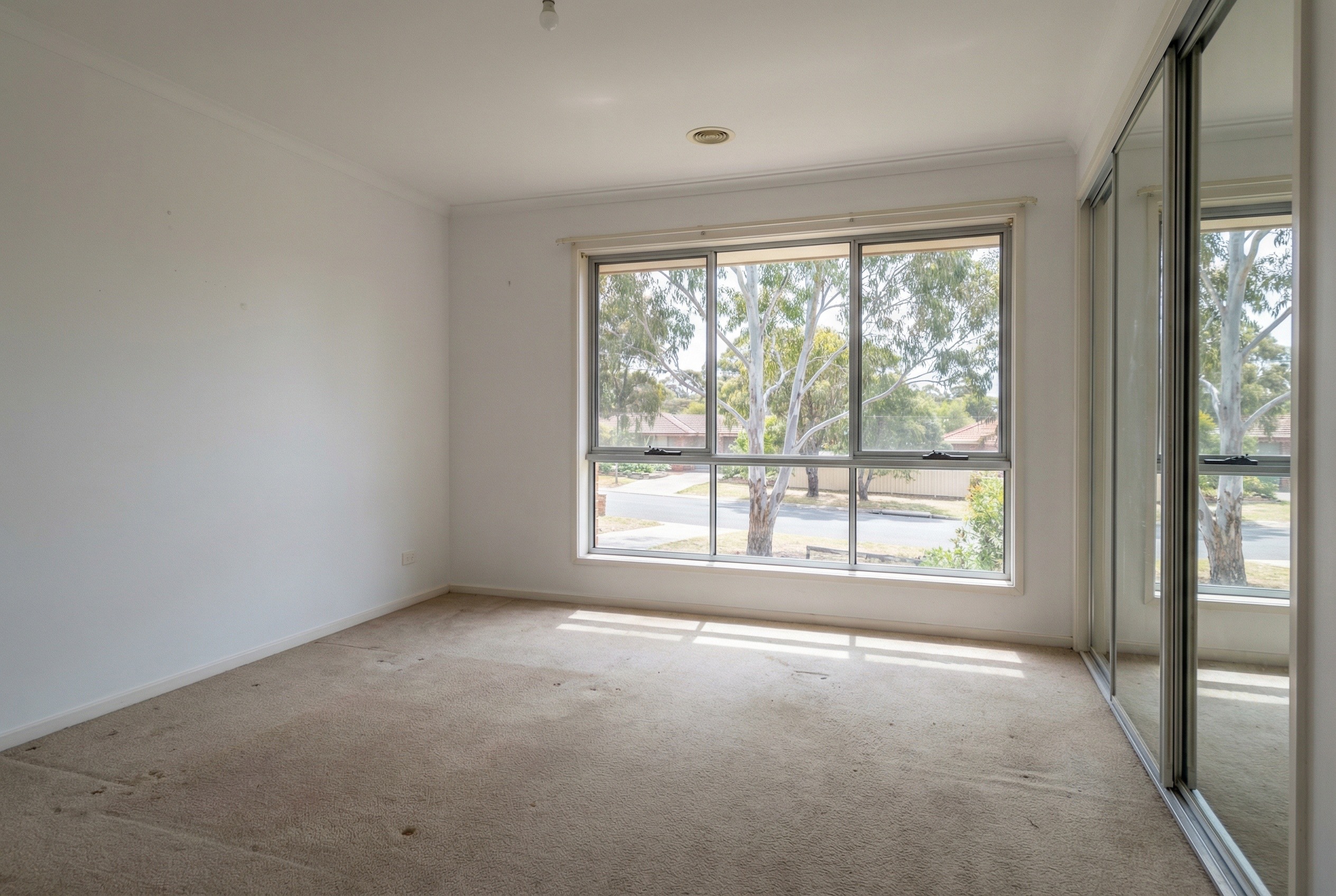 Empty master bedroom before staging - ebook version