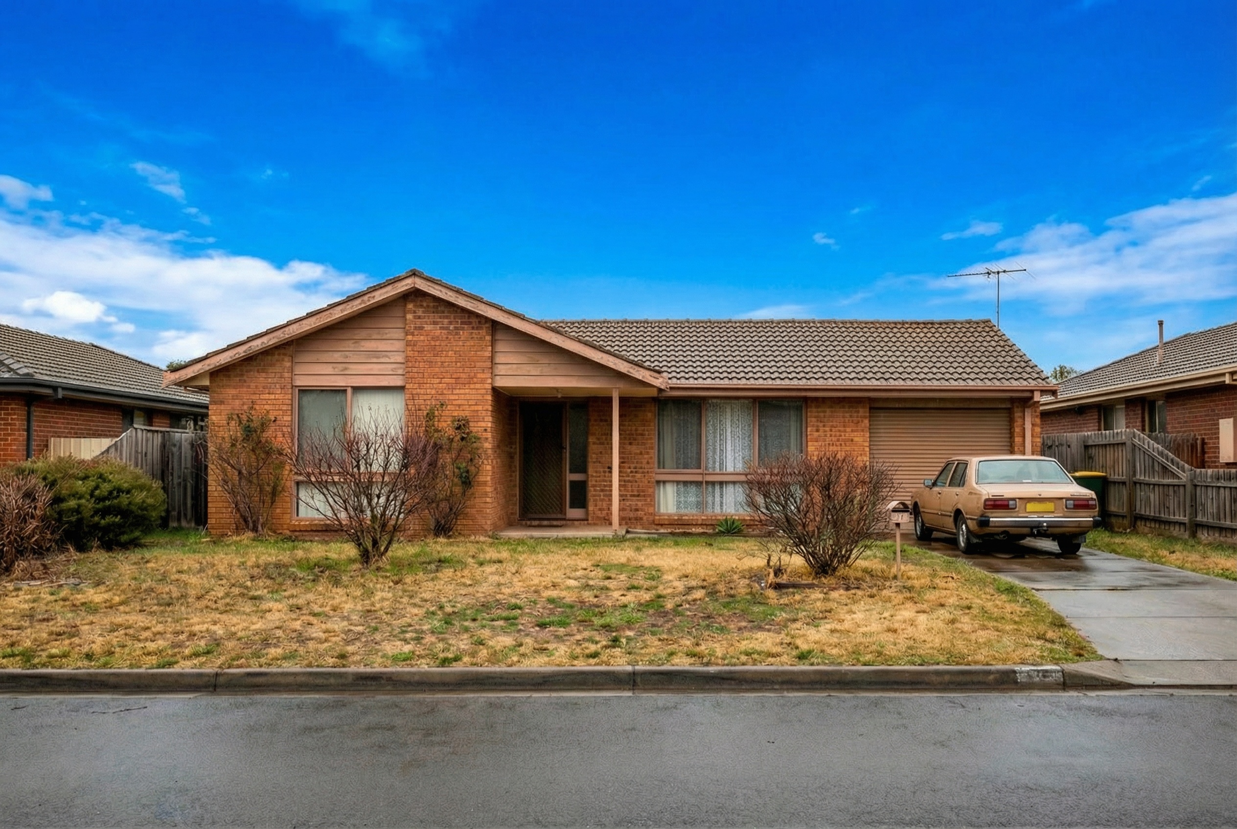 Property exterior with clear blue sky - ebook version