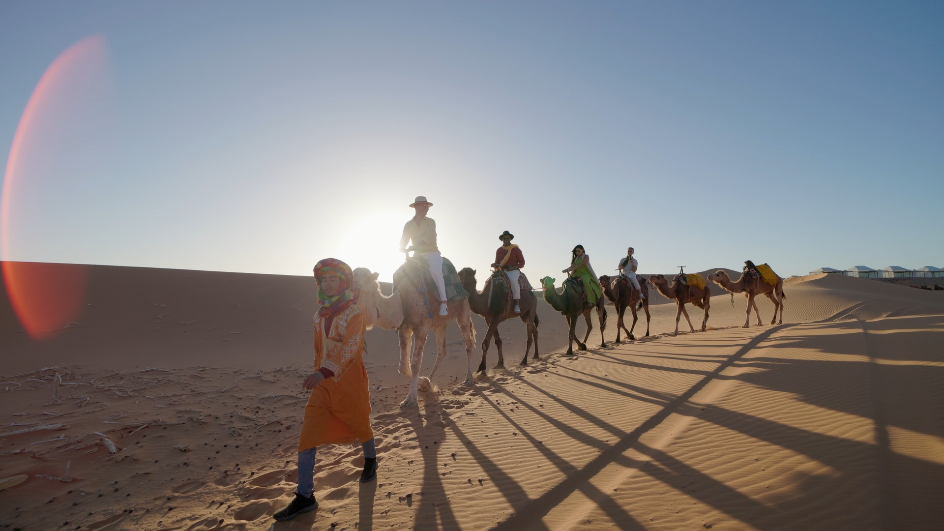 Camel Trekking in the Desert Sunset