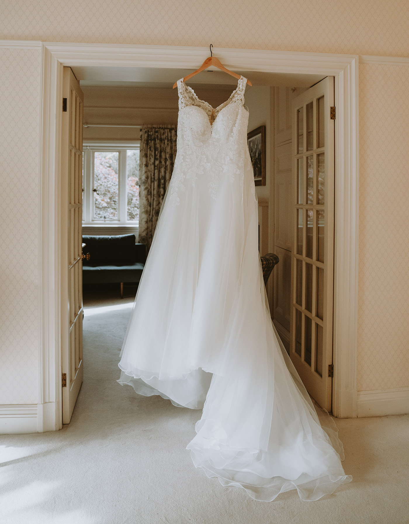 Wedding dress hanging up