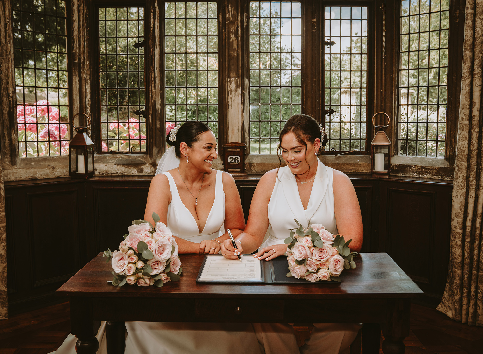 Brides signing the register