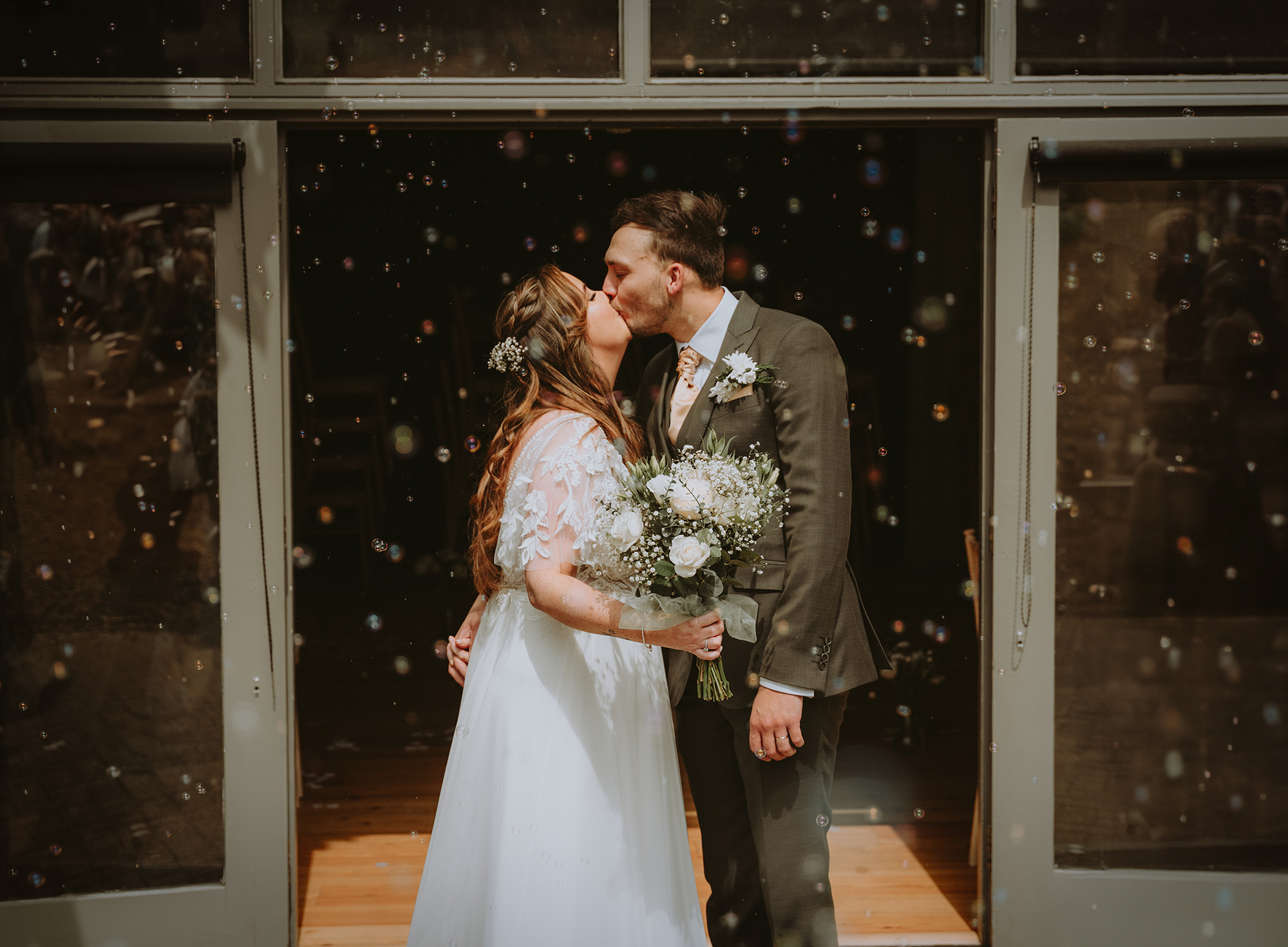 Bride and groom bubble exit