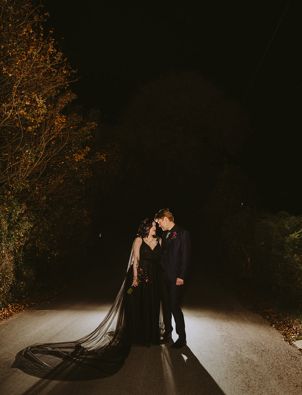 Bride and groom night time portrait