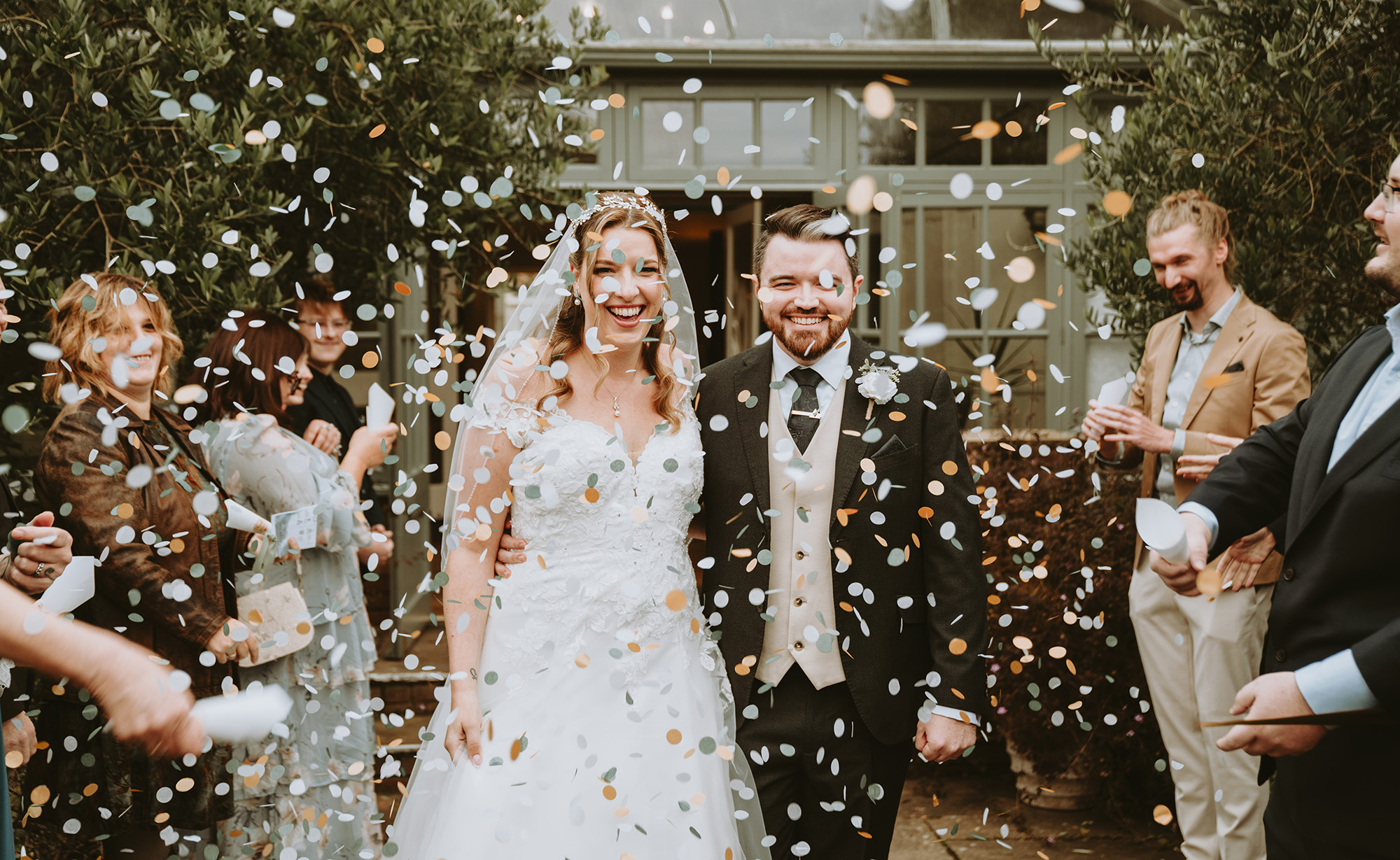 Bride and groom confetti shot