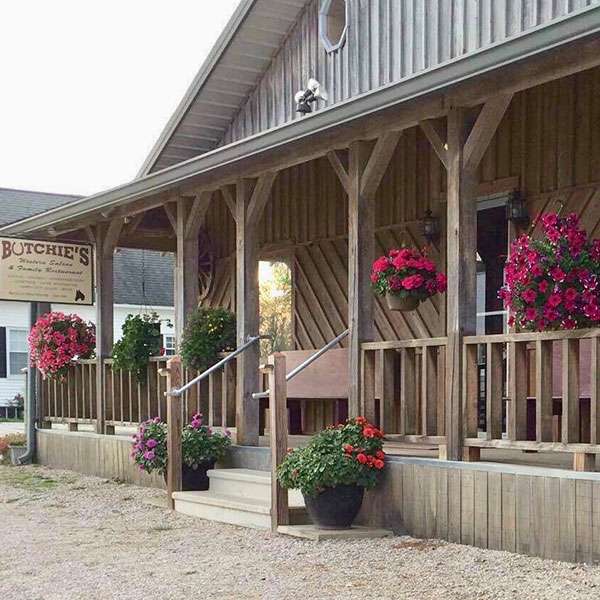 The covered front porch at 5353 Main Street