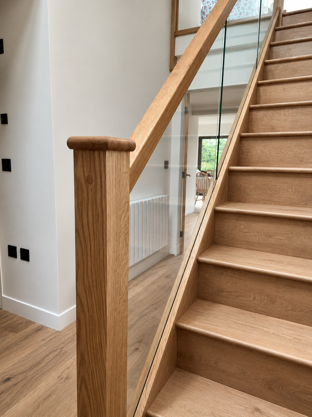 Modern staircase with oak accents