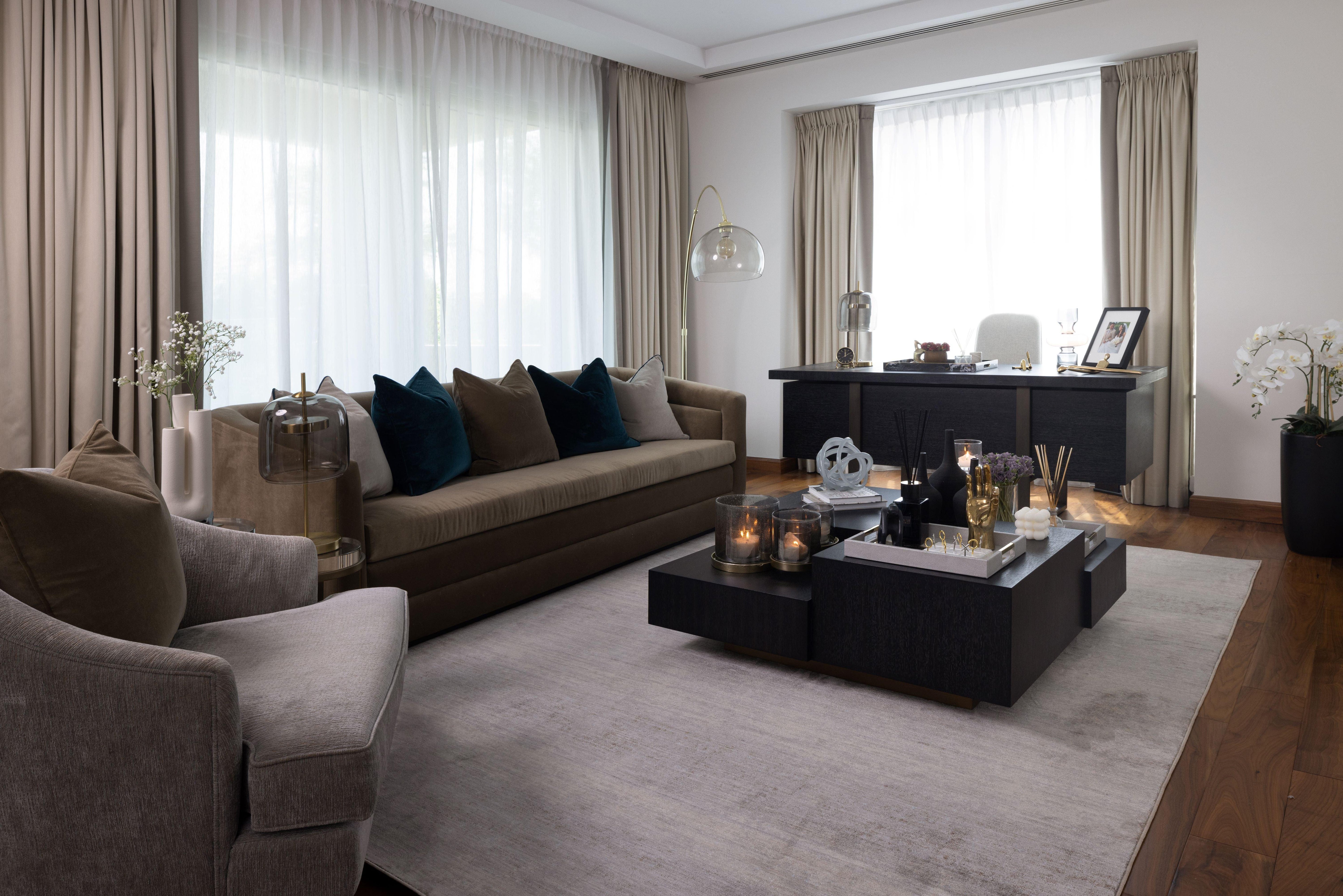 Create a Warm and Welcoming Living Room with Large Rugs