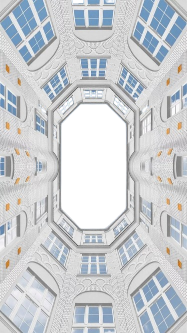 In a Courtyard for Kobo Clara e-reader wallpaper or screensaver featuring building and city and more