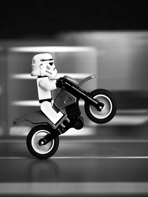 Stormtrooper doing a wheelie on a motorcycle for Other e-reader wallpaper or screensaver featuring lego and stormtrooper and more
