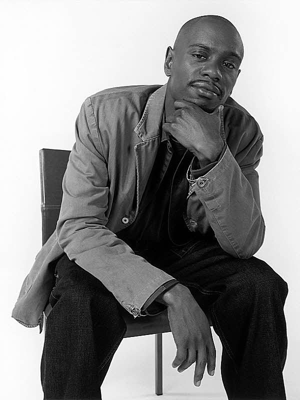 Dave Chappelle seated for Other e-reader wallpaper or screensaver featuring dave chappelle and comedian and more