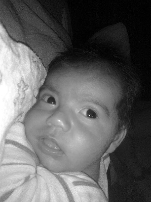 Close-up of a baby's face for Other e-reader wallpaper or screensaver featuring baby and face and more