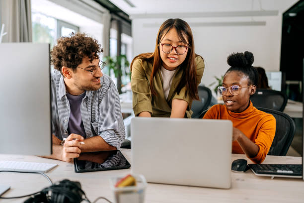 A high school student observing a professional during a job shadowing session.