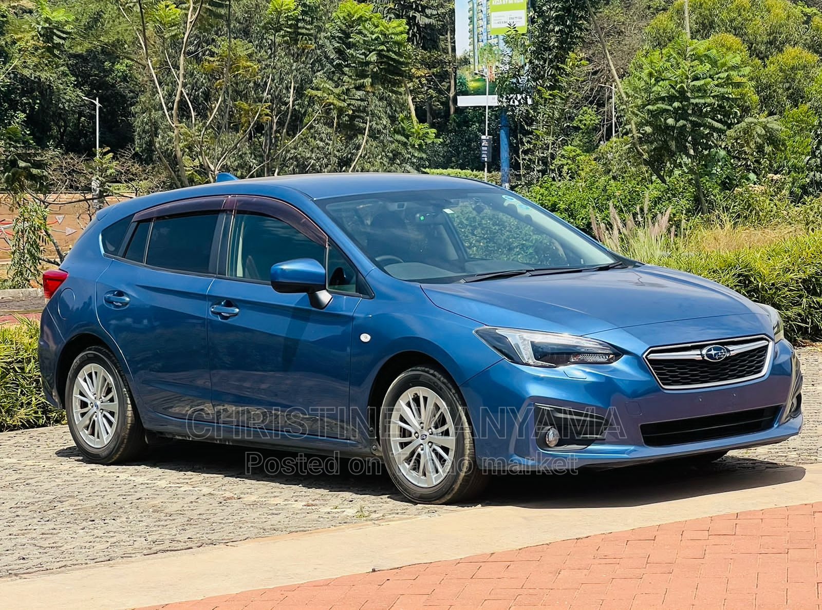 Blue Subaru Impreza 3