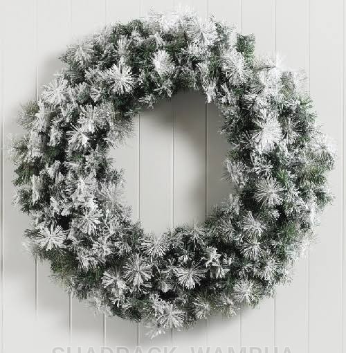 Snow flocked front door Christmas wreath 3