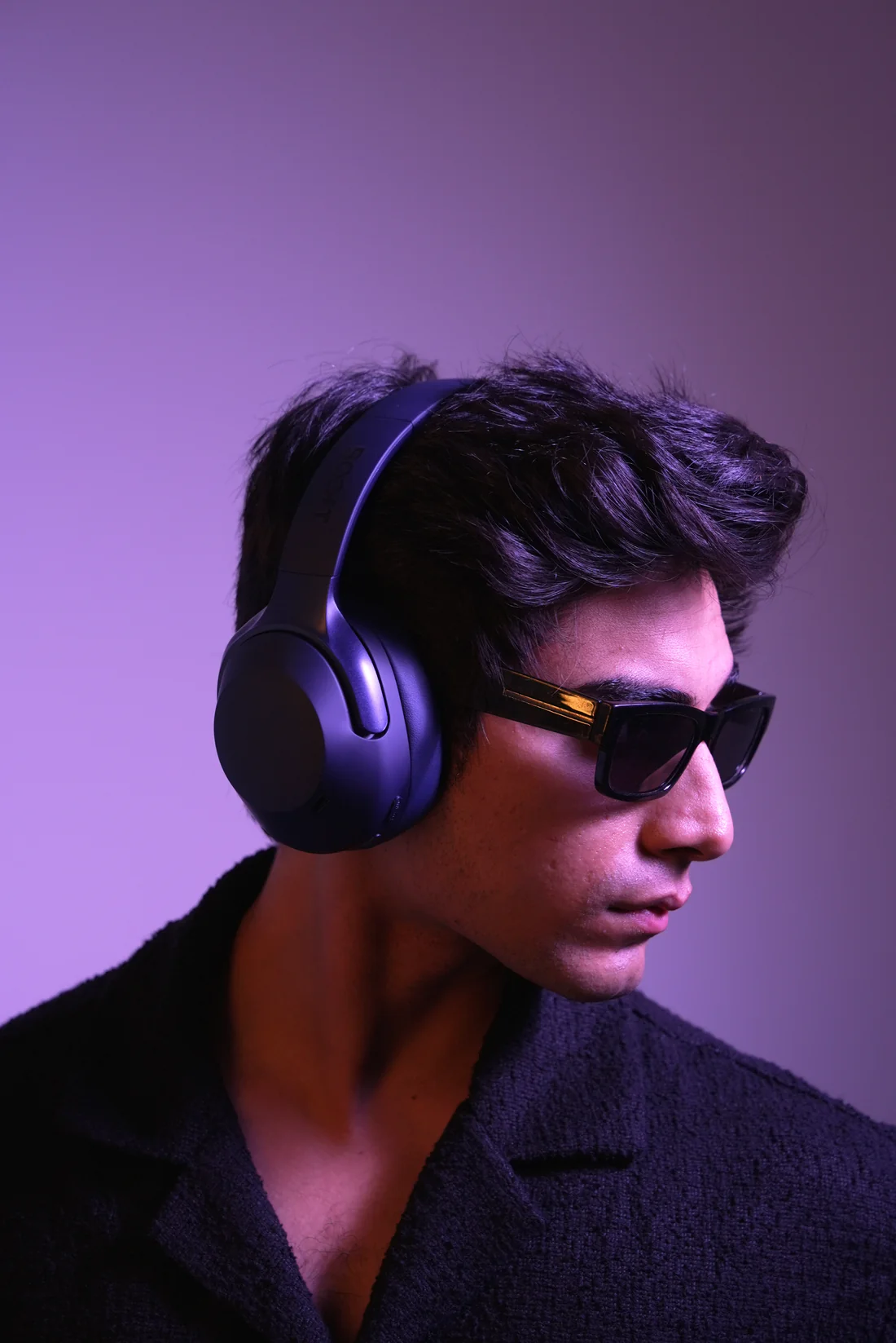 Boost Reverb dark blue spatial audio headset packaged with USB-C and 3.5mm aux cables
