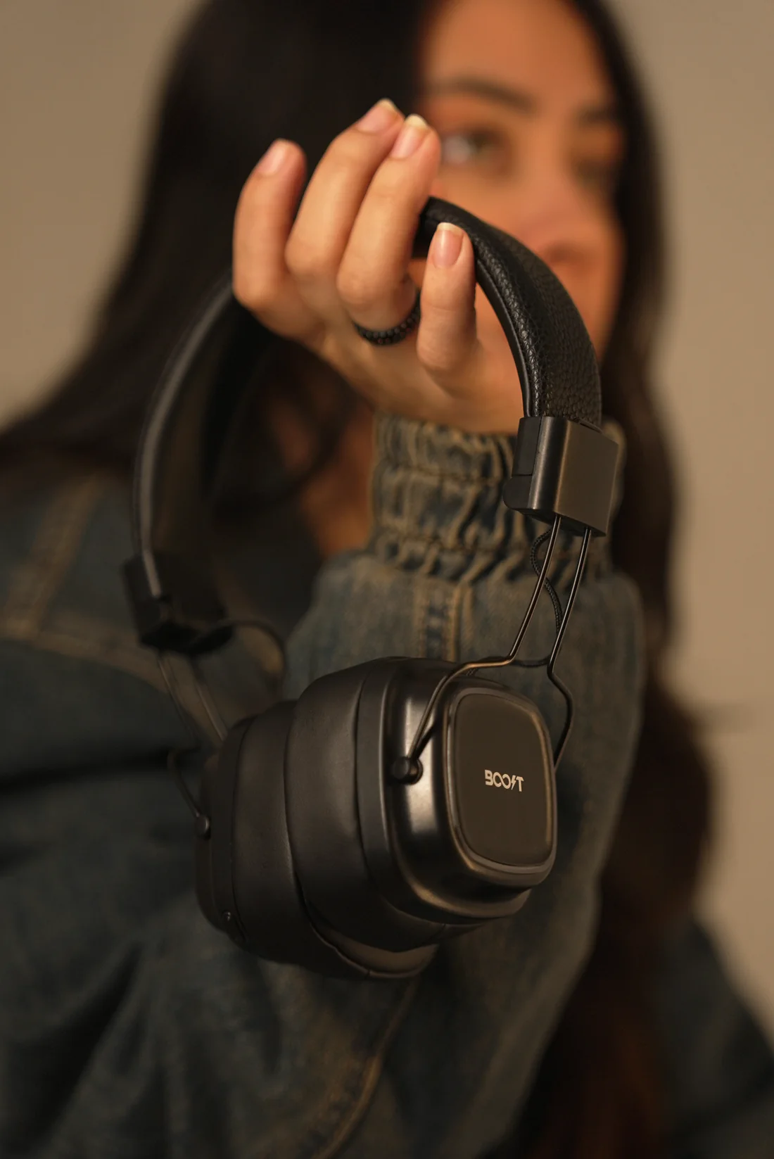 Close-up view of cushioned headband on Boost Harmony audio gear in Brown