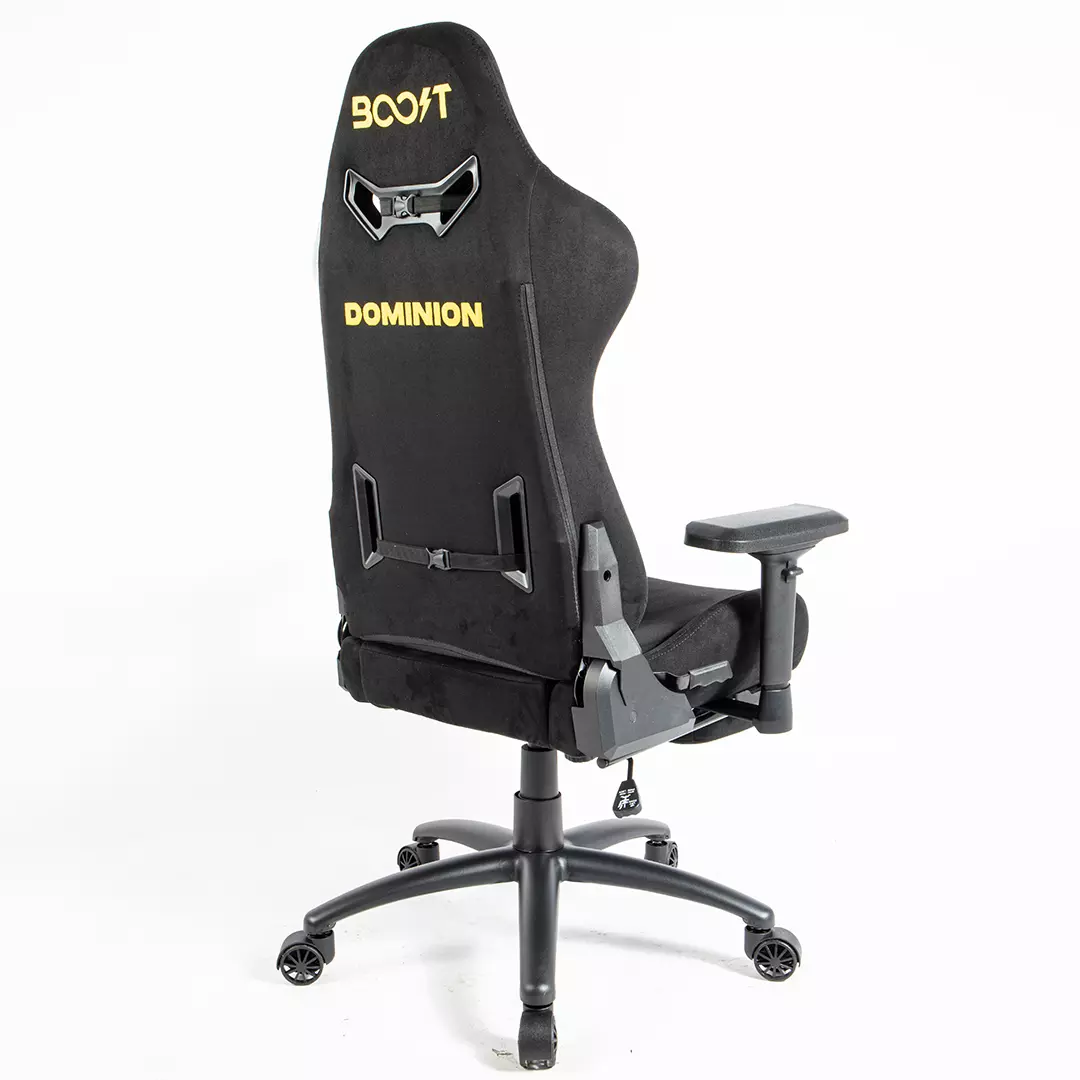 Unboxing components included with Boost Dominion chair including lumbar cushion, headrest pillow, and tool kit