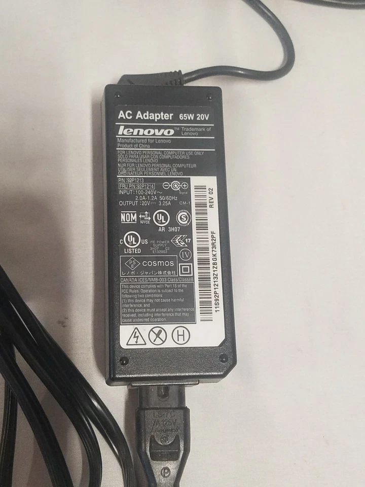 Complete 90W computer power kit displaying the main charging brick next to a 3-pin AC wall cable cord plug.