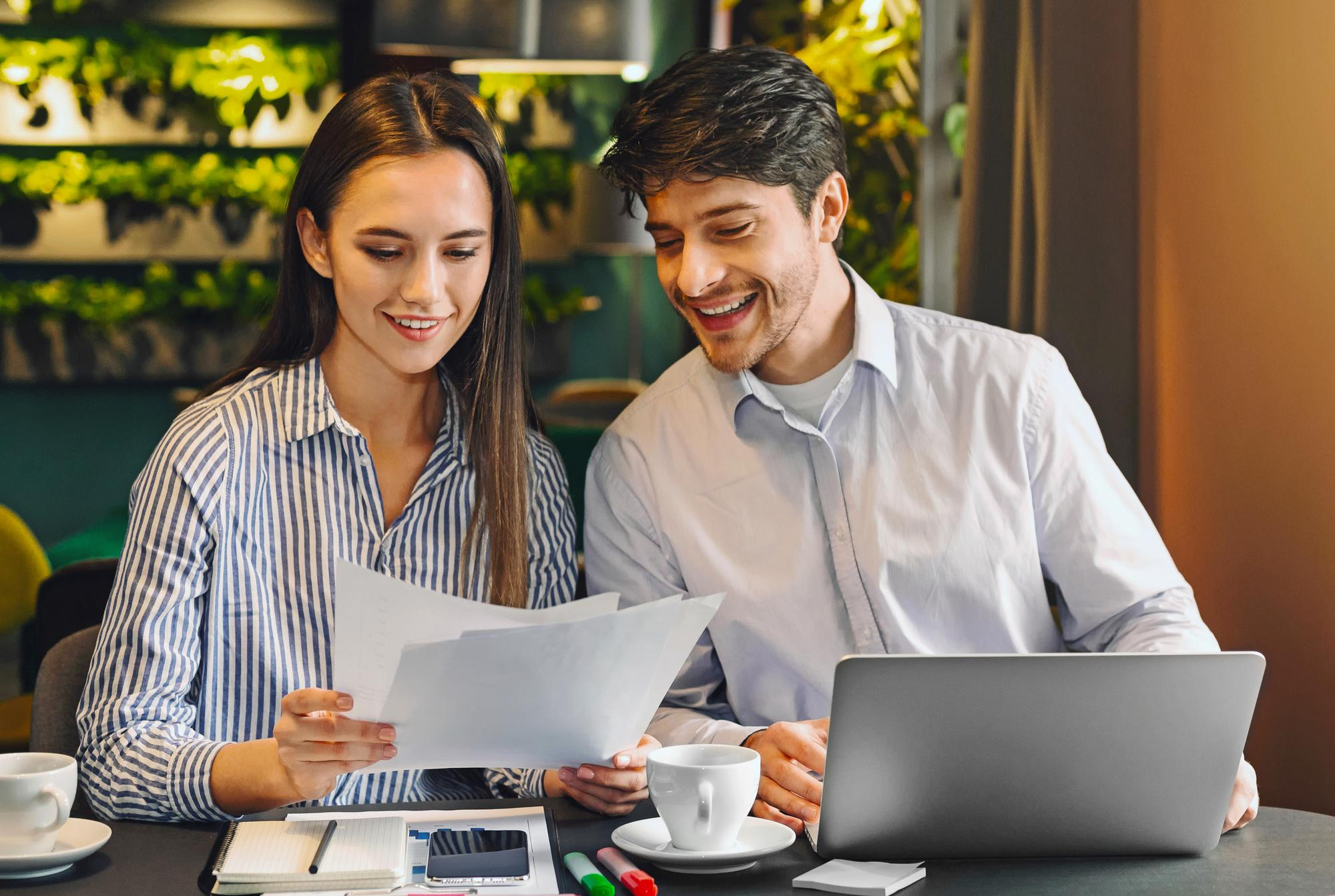 Team reviewing improved workflow